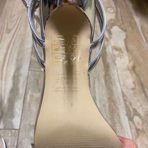 Aldo sandals ,silver!lnever wear outside!like new!